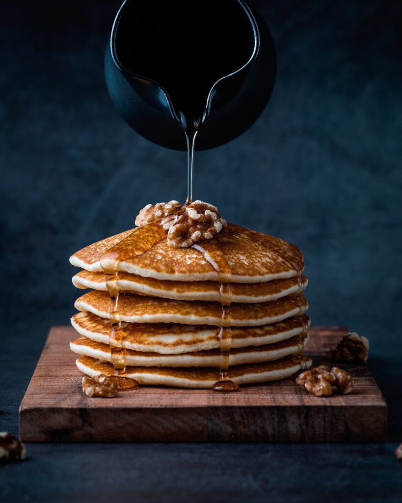 A stack of pancakes with syrup at a Pigeon Forge pancake house