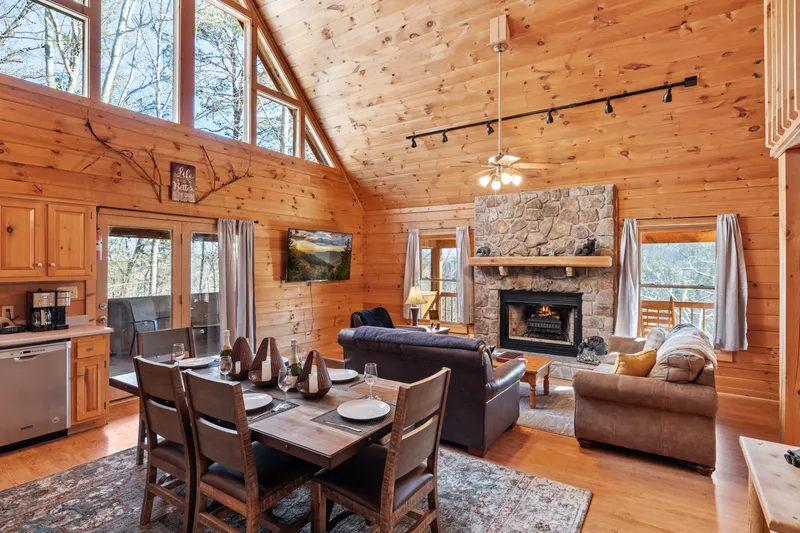 Dining table set for six by the fireplace