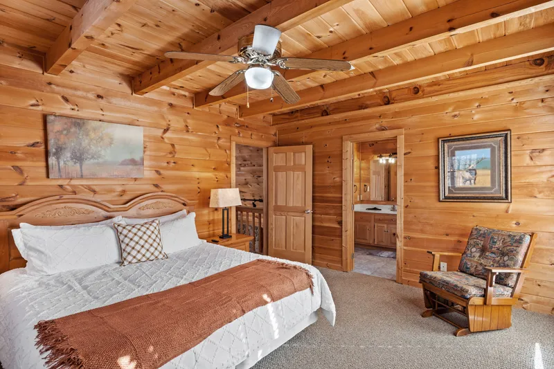 Upper king bedroom with reading chair