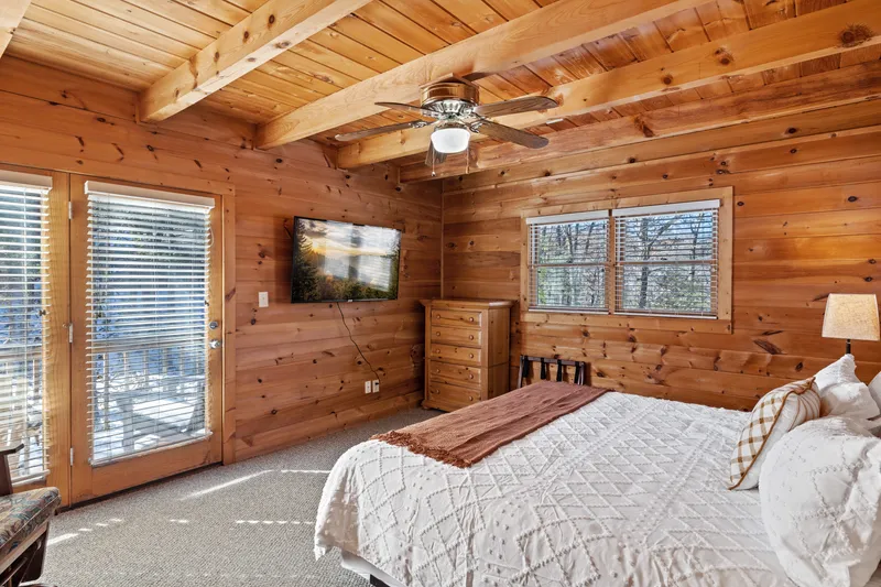 King bed with smart TV, upper level