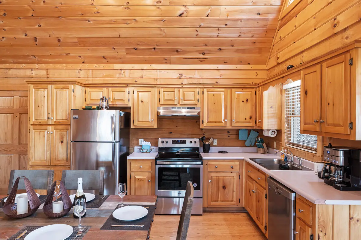 Fully equipped kitchen with stainless appliances at Sunny Sierra Cabin